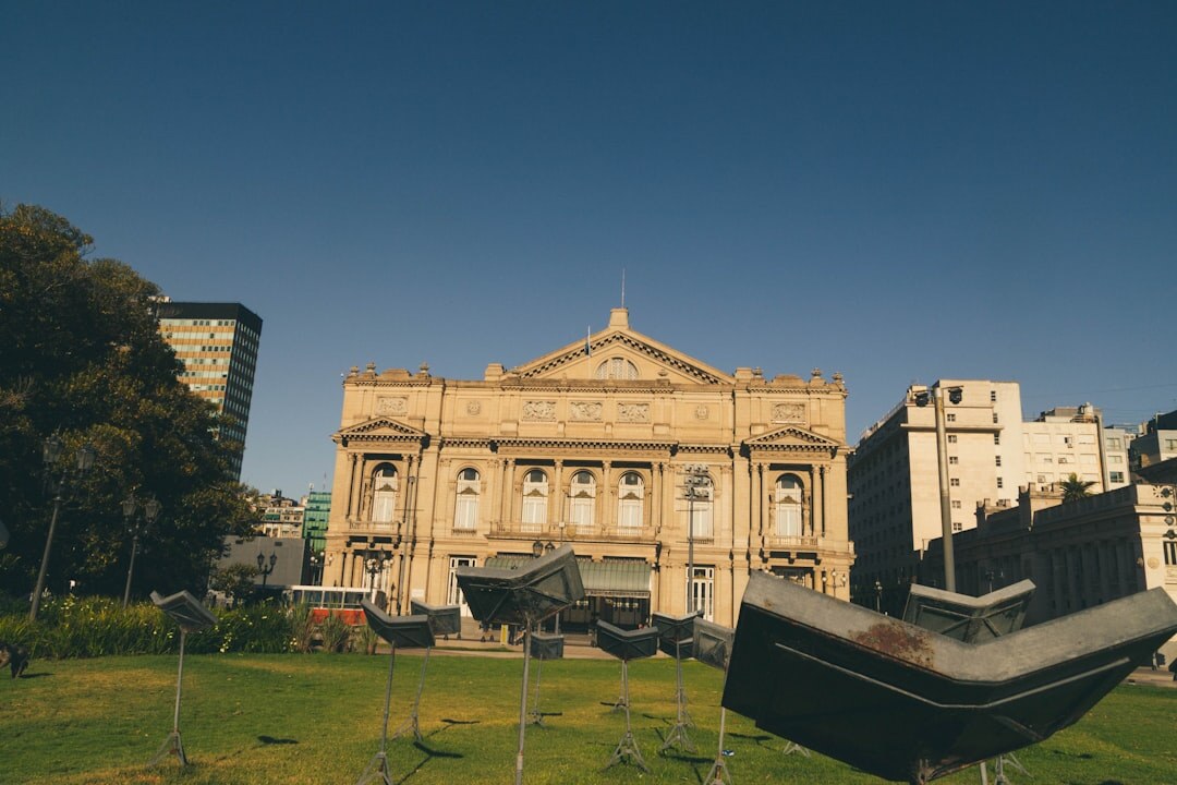Wide shot of a fashion week runway show with an audience in Buenos Aires